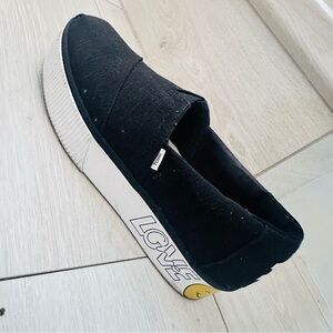 Toms Black Canvas Slip-Ons with White Sole